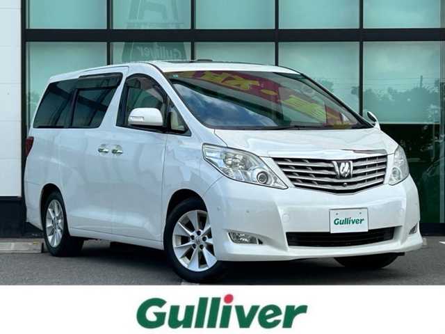 トヨタ アルファード 350G Lパッケージ 和歌山県 2011(平23)年 10.3万km ホワイトパールクリスタルシャイン 純正8インチナビ/フルセグTV/CD/DVD/バックカメラ/ビルトインETC/前後ドライブレコーダー/純正フリップダウンモニター/サンルーフ/両側パワースライドドア/電動リアゲート/クルーズコントロール/クリアランスソナー/革本木目ステアリング/ステアリングスイッチ/レザーシート/全席パワーシート/シートメモリー/運転席シートヒーター/オットマン/クールボックス/HIDヘッドライト/フォグランプ/オートライト/オートワイパー/電動格納ミラー/純正17インチAW/プッシュスタート/スマートキー/スペアキー/取扱説明書