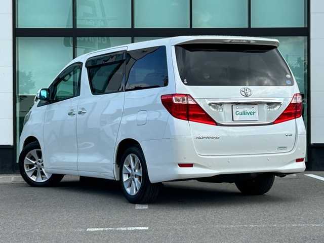 トヨタ アルファード 350G Lパッケージ 和歌山県 2011(平23)年 10.3万km ホワイトパールクリスタルシャイン 純正8インチナビ/フルセグTV/CD/DVD/バックカメラ/ビルトインETC/前後ドライブレコーダー/純正フリップダウンモニター/サンルーフ/両側パワースライドドア/電動リアゲート/クルーズコントロール/クリアランスソナー/革本木目ステアリング/ステアリングスイッチ/レザーシート/全席パワーシート/シートメモリー/運転席シートヒーター/オットマン/クールボックス/HIDヘッドライト/フォグランプ/オートライト/オートワイパー/電動格納ミラー/純正17インチAW/プッシュスタート/スマートキー/スペアキー/取扱説明書