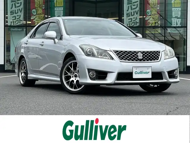 トヨタ クラウン アスリート 岡山県 2011(平23)年 6.5万km シルバーM 登録時走行距離64184km/純正ナビ/地デジTV(AM/FM/CD/DVD)/バックカメラ/ドライブレコーダー/ビルトインETC/本巻きステアリング/クルーズコントロール/横滑り防止装置/D/N席パワーシート/電動格納ミラー/USB入力端子/トランクリッドイージークローザー/純正フロアマット/18インチ社外AW/ユピテルレーダー探知機/プッシュスタート/スマートキー