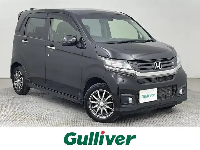 ホンダ Ｎ ＷＧＮ カスタム G ターボパッケージ 道央・札幌 2014(平26)年 5.1万km スマートブラック ・４WD/・DOPギャザーズ7型メモリーナビ/　CD/DVD/SD/USB/フルセグTV/・ステアリングスイッチ/・バックカメラ/・純正エンジンスターター/・あんしんパッケージ/・CTBA(シティブレーキアクティブシステム)/・横滑り防止装置/・ABS/・クルーズコントロール/・パドルシフト/・プラズマクラスター付AAC/・オートライト/・キセノンヘッドライト/・フォグランプ/・ミラーウィンカー/・ミラーヒーター/・ドアバイザー/・純正フロアマット/・プッシュスタート/・スマートキー/・スペアキー/・取扱説明書