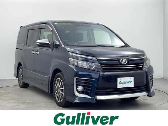 トヨタ ヴォクシー ZS 煌 新潟県 2014(平26)年 7.8万km ブラッキッシュアゲハガラスフレーク 　ワンオーナー/　フルセグテレビ/　バックカメラ/　フリップダウンモニター/　プッシュスタート/　両側パワースライドドア/　ETC/　LEDヘッドライト/　オートライト/　アイドリングストップ/　ウィンカーミラー/　ドアバイザー