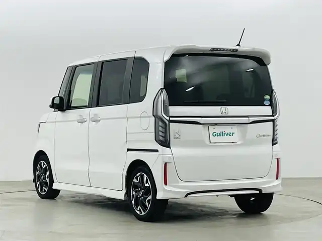 ホンダ Ｎ ＢＯＸ カスタム G L ターボ ホンダセンシング 福島県 2019(令1)年 4.2万km プラチナホワイトパール ホンダセンシング/・衝突被害軽減ブレーキ/・路外逸脱抑制装置/・レーダークルーズコントロール/・先行車発進お知らせ機能/・標識認識機能/純正ナビ/・型番：VXM-205Ci/・CD/Bluetooth/USB/AM/FM/・バックカメラ/・ETC/両側パワースライドドア/革巻きステアリング/・ステアリングリモコン/・パドルシフト/ハーフレザーシート/プッシュスタート/・スマートキー/・スペアキー/LEDヘッドライト/・オートライト/・フォグライト/電動格納ウィンカーミラー/純正フロアマット/取扱説明書/保証書