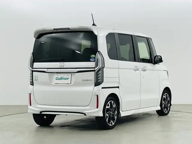 ホンダ Ｎ ＢＯＸ カスタム G L ターボ ホンダセンシング 福島県 2019(令1)年 4.2万km プラチナホワイトパール ホンダセンシング/・衝突被害軽減ブレーキ/・路外逸脱抑制装置/・レーダークルーズコントロール/・先行車発進お知らせ機能/・標識認識機能/純正ナビ/・型番：VXM-205Ci/・CD/Bluetooth/USB/AM/FM/・バックカメラ/・ETC/両側パワースライドドア/革巻きステアリング/・ステアリングリモコン/・パドルシフト/ハーフレザーシート/プッシュスタート/・スマートキー/・スペアキー/LEDヘッドライト/・オートライト/・フォグライト/電動格納ウィンカーミラー/純正フロアマット/取扱説明書/保証書