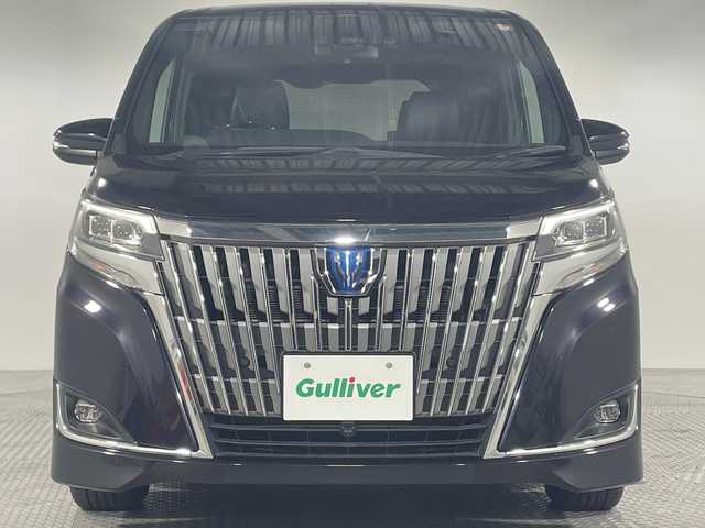 トヨタ エスクァイア ハイブリッド Gi 神奈川県 2020(令2)年 3.5万km スパークリングブラックパールクリスタルシャイン 純正10型SDナビゲーション【NSZN-Z68T】/AM FM フルセグ Bluetooth CD DVD SD/バックカメラ/社外フロントカメラ/純正フリップダウンモニター/両側パワースライドドア/セーフティセンス/プリクラッシュセーフティシステム/レーンディパーチャーアラート/先行車発進告知機能/パーキングサポートブレーキ/クリアランスソナー/クルーズコントロール/トラクションコントロール/前方ドライブレコーダー/レザーシート/前席シートヒーター/ビルトインETC/ステアリングリモコン/スマートキー/LEDヘッドライト/オートライト/オートマチックハイビーム/純正15インチアルミホイル/ドアバイザー