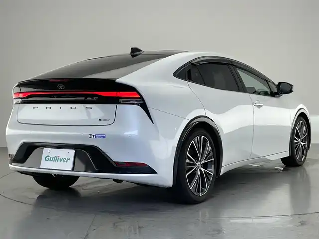 トヨタ プリウス Z 愛知県 2023(令5)年 3.8万km プラチナホワイトパールマイカ 純正１２．３型ＤＡフルセグＴＶ　ＨＤＭＩ　パノラマルーフ　全方位カメラ　デジタルインナーミラー　電動リアゲート　トヨタチームメイト　黒革　シートヒーター　ワイヤレス充電　衝突軽減　追従クルコン　アドバンスドパーク　トヨタセーフティセンス　コーナーセンサー　ＬＥＤオートライト　シートベンチレーション　ハンドルヒーター　ＡＣ100Ｖ電源　ＢＳＭ　内蔵型前後ドラレコ　禁煙車