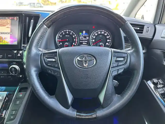 トヨタ ヴェルファイア Z Gエディション 宮城県 2015(平27)年 9.9万km ブラック ツインムーンルーフ/プリクラッシュセーフティー/レーダークルーズコントロール/＝＝＝/SILKBLAZEフロントエアロ/ダウンサスペンション/インテリジェントクリアランスソナー/純正ディーラーOP10インチナビ/フルセグTV/Bluetooth/CD/DVD/SD/ハーフレザーシート/ステリングヒーター/サンシェード/両側パワースライドドア/LEDヘッドライト/ウッドコンビハンドル/ステアリングスイッチ/スペアキー/純正18インチAW/保証書/取扱説明書