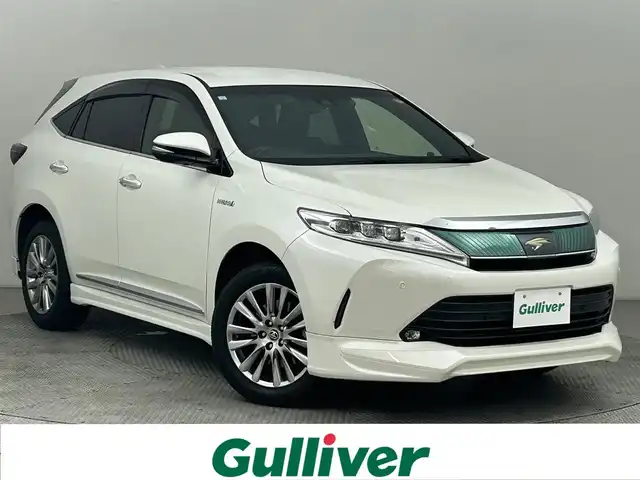トヨタ ハリアー ハイブリッド プレミアム 道央・札幌 2019(平31)年 5.2万km ホワイトパールクリスタルシャイン ・純正９インチナビ/・フルエアロ/・衝突軽減ブレーキ/・横滑り防止機能/・バックカメラ/・レーンアシスト/・パワーシート/・パワーバックドア/・フルセグＴＶ/・Ｂｌｕｅｔｏｏｔｈオーディオ/・オートライト/・オートハイビーム/・ＥＴＣ２．０/・純正アルミホイール/・ドアバイザー/・コーナーセンサー/・クリアランスソナー/・HDMI入力端子/・スマートキー＆プッシュスタート/・アダプティブクルーズコントロール/・LEDヘッドライト