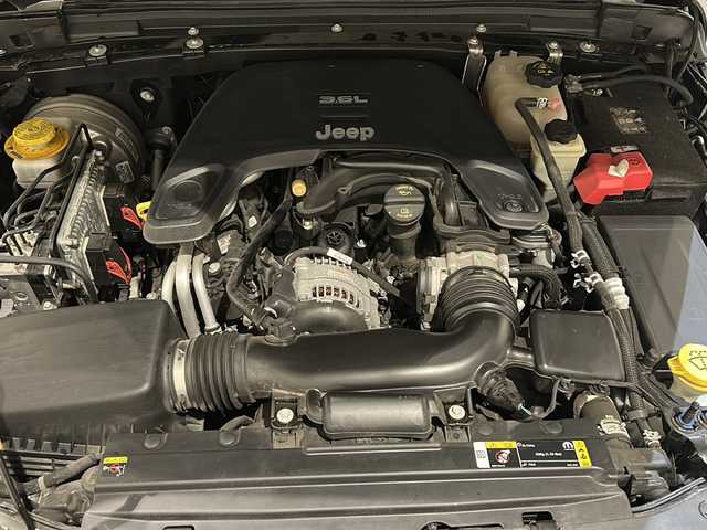 クライスラー・ジープ ラングラー アンリミテッド サハラ 新潟県 2021(令3)年 3.9万km ブラック SMITTYBILTディフェンダーラック/標準装備/サブウーハー付アルパイン製プレミアムスピーカー/オーディオナビゲーションシステムUconnect /8.4インチVGAタッチパネルモニター/・AM/FMラジオ/・地上デジタルテレビチューナー/・Bluetooth/・USB・iPod ・ iPhone/・AUX/ParkSense/ParkviewTMリアバックアップカメラ/アダプティブ クルーズ コントロール/ブラインドスポットモニター/リアクロスパスディテクション/LEDヘッドライト（オートレベリング機能）/・デイタイムランニングランプ/・オートハイビームヘッドライト/レザーシートJeepロゴ/フロントシートヒーター/ステアリングヒーター/ETC2.0