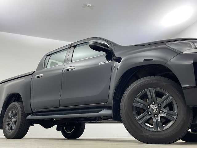 トヨタ ハイラックス Z 新潟県 2021(令3)年 6万km アティチュードブラックマイカ 4WD/11インチアルパインフローティングナビ/　フルセグTV/Bluetooth/CD/DVD/USB/HDMI/プリクラッシュセーフティ/レーンキープアシスト/レーダークルーズコントロール/前後コーナーセンサー/バックモニター/ETC/LEDヘッドライト/アイドリングストップ/横滑り防止装置/純正トノカバー/純正ベッドライナー/レザー調シートカバー