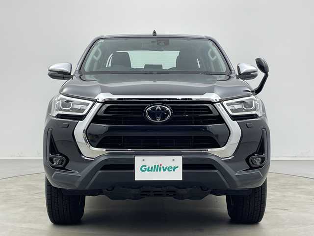 トヨタ ハイラックス Z 新潟県 2021(令3)年 6万km アティチュードブラックマイカ 4WD/11インチアルパインフローティングナビ/　フルセグTV/Bluetooth/CD/DVD/USB/HDMI/プリクラッシュセーフティ/レーンキープアシスト/レーダークルーズコントロール/前後コーナーセンサー/バックモニター/ETC/LEDヘッドライト/アイドリングストップ/横滑り防止装置/純正トノカバー/純正ベッドライナー/レザー調シートカバー