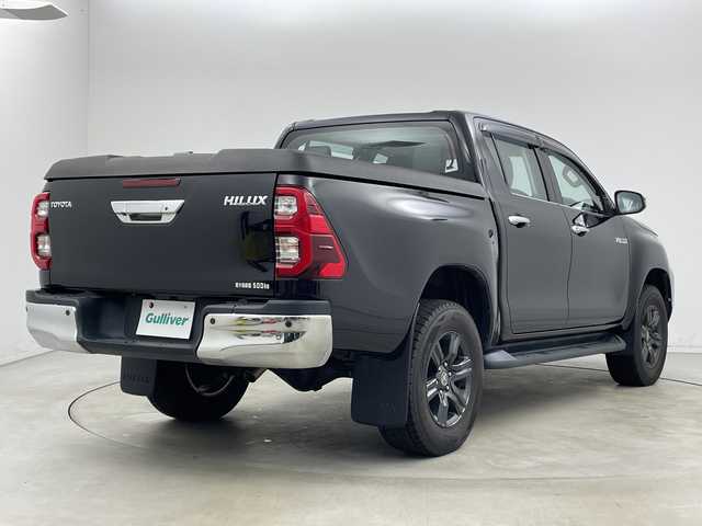 トヨタ ハイラックス Z 新潟県 2021(令3)年 6万km アティチュードブラックマイカ 4WD/11インチアルパインフローティングナビ/　フルセグTV/Bluetooth/CD/DVD/USB/HDMI/プリクラッシュセーフティ/レーンキープアシスト/レーダークルーズコントロール/前後コーナーセンサー/バックモニター/ETC/LEDヘッドライト/アイドリングストップ/横滑り防止装置/純正トノカバー/純正ベッドライナー/レザー調シートカバー
