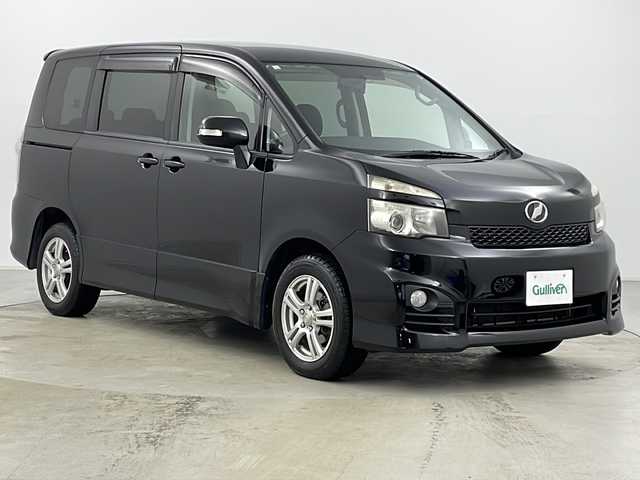 トヨタ ヴォクシー ZS 道央・札幌 2010(平22)年 7.3万km ブラック ・純正ナビTV&CD&DVD&BT&SD/・寒冷地仕様/・バックカメラ/・純正フリップダウンモニター/・パドルシフト/・ステアリングスイッチ/・両側パワースライドドア/・フロントワイパーデアイサー/・社外フロアマット/・社外エンジンスターター/・オートライト/・HIDヘッドライト/・ビルトインETC/・純正AW付サマータイヤ積込/・スマートキー/・スペアキー