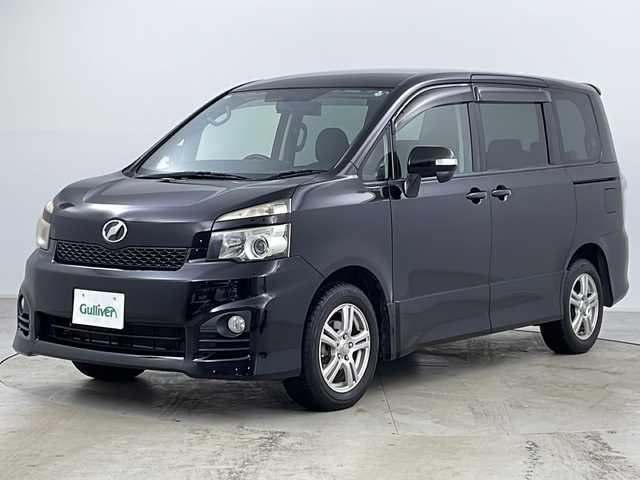 トヨタ ヴォクシー ZS 道央・札幌 2010(平22)年 7.3万km ブラック ・純正ナビTV&CD&DVD&BT&SD/・寒冷地仕様/・バックカメラ/・純正フリップダウンモニター/・パドルシフト/・ステアリングスイッチ/・両側パワースライドドア/・フロントワイパーデアイサー/・社外フロアマット/・社外エンジンスターター/・オートライト/・HIDヘッドライト/・ビルトインETC/・純正AW付サマータイヤ積込/・スマートキー/・スペアキー