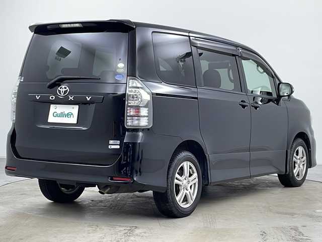 トヨタ ヴォクシー ZS 道央・札幌 2010(平22)年 7.3万km ブラック ・純正ナビTV&CD&DVD&BT&SD/・寒冷地仕様/・バックカメラ/・純正フリップダウンモニター/・パドルシフト/・ステアリングスイッチ/・両側パワースライドドア/・フロントワイパーデアイサー/・社外フロアマット/・社外エンジンスターター/・オートライト/・HIDヘッドライト/・ビルトインETC/・純正AW付サマータイヤ積込/・スマートキー/・スペアキー