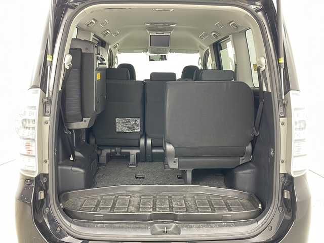 トヨタ ヴォクシー ZS 道央・札幌 2010(平22)年 7.3万km ブラック ・純正ナビTV&CD&DVD&BT&SD/・寒冷地仕様/・バックカメラ/・純正フリップダウンモニター/・パドルシフト/・ステアリングスイッチ/・両側パワースライドドア/・フロントワイパーデアイサー/・社外フロアマット/・社外エンジンスターター/・オートライト/・HIDヘッドライト/・ビルトインETC/・純正AW付サマータイヤ積込/・スマートキー/・スペアキー