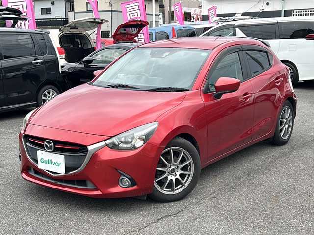 マツダ デミオ XD ツーリング 愛知県 2015(平27)年 8万km ソウルレッドプレミアムメタリック /禁煙車//メーカーナビ・フルセグTV//DVD再生.SD.BT.USB.AUX//バックカメラ/ETC//スマートシティブレーキサポート//クルーズコントロール//プッシュスタート//電動格納ミラーウインカー//ステアリングスイッチ//LEDオートライト//社外１６インチアルミ//純正ドアバイザー//純正フロアマット//新車保証書/取扱説明書//スペアキー