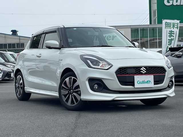 スズキ スイフト HYBRID RS 静岡県 2017(平29)年 1万km ピュアホワイトP ●ワンオーナー/●純正メモリーナビ/（フルセグ/CD/DVD/USB/Bluetooth）/●全方位カメラ/●運転席シートヒータ/●レーダークルーズコントロール/●衝突軽減システム/●レーンキープアシスト/●LED/●オートライト/●フォグランプ/●革巻きステアリング/●ステアリングスイッチ/●パドルシフト/●ETC/●横滑り防止装置/●アイドリングストップ/●電動格納ウィンカーミラー/●トノカバー/●純正フロアマット/●ドアバイザー/●ISOFIX/●純正16インチアルミホイール/●プッシュスタート/●スマートキー/●スペアキー×1/●W＋サイド＋カーテンSRS＋ABS/●保証書/●取扱説明書