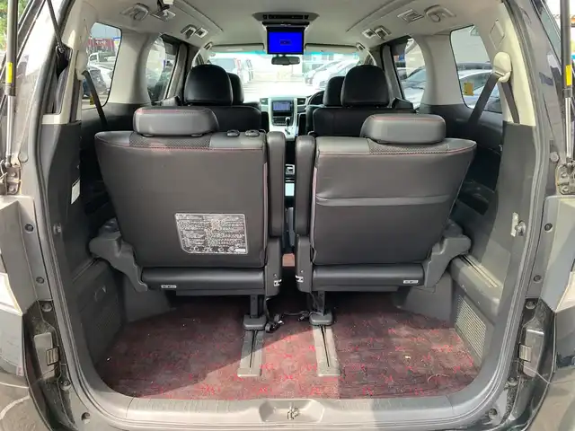 トヨタ ヴェルファイア 2．4Z ゴールデンアイズⅡ 福井県 2013(平25)年 12.5万km ブラック (株)IDOMが運営する【じしゃロン福井店】の自社ローン専用車両になりますこちらは現金またはオートローンご利用時の価格です。自社ローンご希望の方は別途その旨お申付け下さい/純正ナビ/Bluetooth/TV/CD/DVD/フリップダウンモニター/バックカメラ/両側パワースライドドア/電動リアゲート/コーナーセンサー/クルーズコントロール/オットマン/ウォークスルー/ハーフレザーシート/純正アルミホイール/オートライト/フォグライト/ETC/ドアバイザー/ステアリングスイッチ/プッシュスタート/スマートキー/スペアキー/保証書、取扱説明書