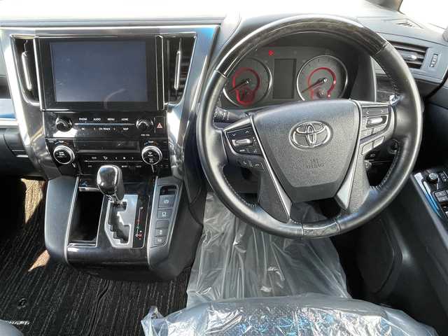 トヨタ アルファード S タイプゴールド 大阪府 2020(令2)年 5.9万km ホワイトパールクリスタルシャイン トヨタセーフティセンス/純正９インチナビ　/   フルセグTV/Bluetooth/USB/CD/DVDデッキ　/バックモニター　/１２．１インチ後席モニター/クリアランスソナー　/ブラインドスポットモニター/両側パワースライドドア　/レーダークルーズコントロール/電動リアゲート　/アイドリングストップ/前後ドライブレコーダー/オートマチックハイビーム/オットマン/純正18インチアルミホイール/純正フロアマット/プッシュスタート/スマートキー　/ＥＴＣ　/三眼ＬＥＤ