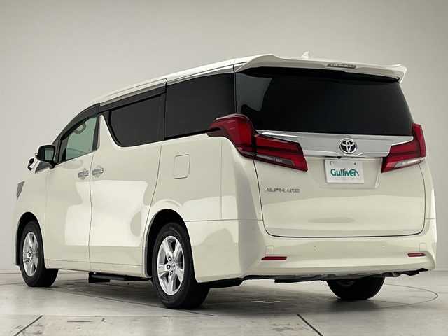 トヨタ アルファード X 愛知県 2019(令1)年 3万km ラグジュアリーホワイトパールクリスタルシャインガラスフレーク オートステップ/10型ナビ/フリップダウンモニター/バックカメラ/両側パワースライドドア/サンルーフ/衝突軽減システム/レーダークルーズコントロール/ETC/LEDヘッドライト/革調シートカバー/ステアリングスイッチ/スマートキー/プッシュスタート/純正アルミホイール