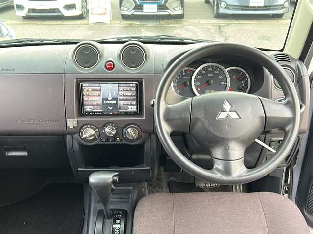 三菱 パジェロ ミニ VR 富山県 2010(平22)年 4万km クールシルバーM/ラズベリーレッドP 4WD/社外ナビ/フルセグ/DVD/CD/ETC/フォグランプ/電動格納ミラー/純正アルミホイール/純正フロアマット/背面タイヤ