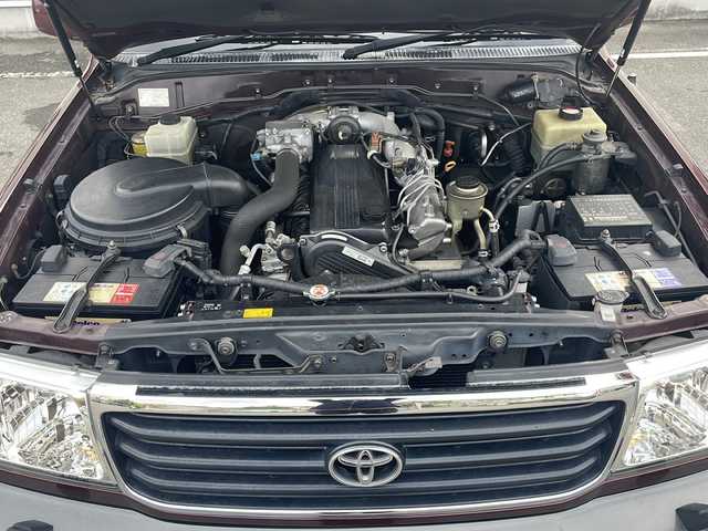 トヨタ ランドクルーザー VX－LTD 秋田県 2001(平13)年 11.1万km レッドマイカ ・サンルーフ/・ルーフレール/・シートヒーター/・レザーシート/・ドライブレコーダー/・クルーズコントロール/・ＡＢＳ/・クルーズコントロール・/・純正フロアマット/・純正アルミホイール/・ＡＡＣ/・４WD/・オートライト/・パワーウィンドウ/・パワーステアリング