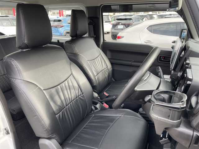 スズキ ジムニー XG 長野県 2023(令5)年 2.7万km スペリアホワイト 禁煙車/4WD/10インチフローティングマルチオーディオ/Bluetooth/社外スロットルコントローラー/グリルガード/オーバーフェンダー/背面タイヤカバー/1.5インチリフトアップキット/ルーフラック/リアラダー/純正足回り車載/ETC/純正アルミホイール/ダウンヒルアシスト/フォグランプ/LEDヘッドライト/オートライト/横滑り防止装置/ABS/ドアバイザー/リモコンキー/アイドリングストップ/パワーウインドウ/パワーステアリング/新車時保証書/取扱説明書