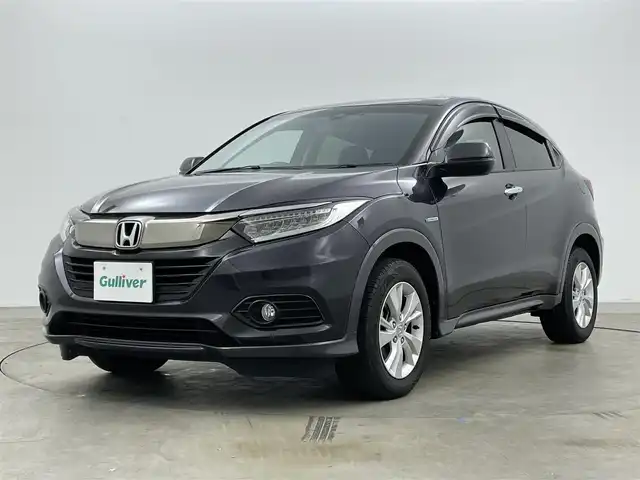 ホンダ ヴェゼル ハイブリッド X ホンダセンシング 岡山県 2020(令2)年 3万km ルーセブラックM ８インチナビ　/レーダークルーズコントロール　/ビルトインＥＴＣ　/ＬＥＤヘッドライト　/バックカメラ　/ドライブレコーダー　前後　/オートハイビーム　/スマートキー　/アイドリングストップ　/ミュージックサーバー　/純正フロアマット/禁煙車/オートブレーキホールド/パドルシフト/踏み間違い防止/フォグライト