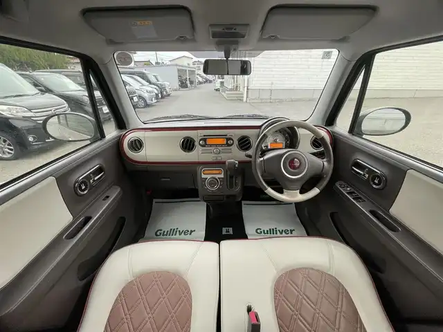 スズキ ラパン ショコラ X 山形県 2014(平26)年 3.7万km シャンパンピンクPM 禁煙車/４ＷＤ/シートヒーター/スマートキー/ＨＩＤヘッドライト/オートエアコン/純正１４インチアルミ/ショコラ専用合皮シート/アイドリングストップ/電動格納ミラー/盗難防止装置/プライバシーガラス/スタッドレス車載