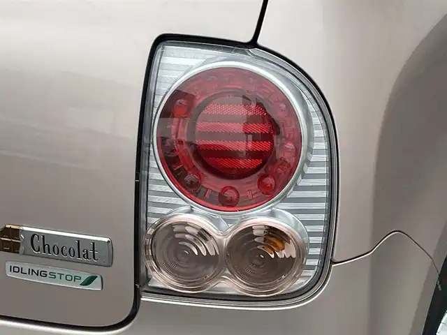 スズキ ラパン ショコラ X 山形県 2014(平26)年 3.7万km シャンパンピンクPM 禁煙車/４ＷＤ/シートヒーター/スマートキー/ＨＩＤヘッドライト/オートエアコン/純正１４インチアルミ/ショコラ専用合皮シート/アイドリングストップ/電動格納ミラー/盗難防止装置/プライバシーガラス/スタッドレス車載