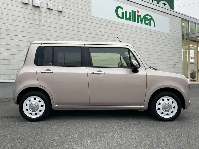 スズキ ラパン ショコラ X 山形県 2014(平26)年 3.7万km シャンパンピンクPM 禁煙車/４ＷＤ/シートヒーター/スマートキー/ＨＩＤヘッドライト/オートエアコン/純正１４インチアルミ/ショコラ専用合皮シート/アイドリングストップ/電動格納ミラー/盗難防止装置/プライバシーガラス/スタッドレス車載