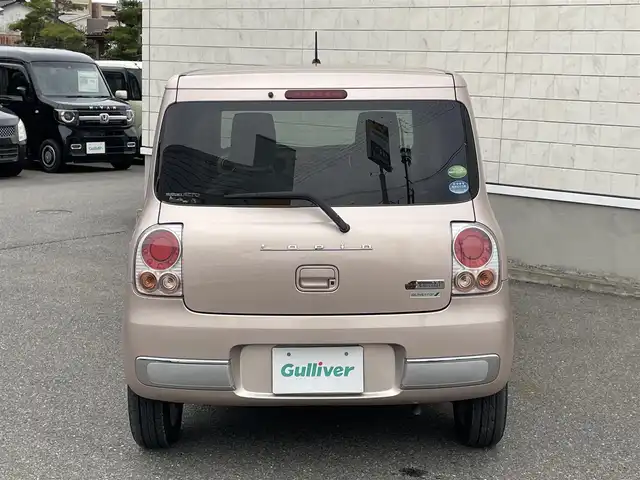 スズキ ラパン ショコラ X 山形県 2014(平26)年 3.7万km シャンパンピンクPM 禁煙車/４ＷＤ/シートヒーター/スマートキー/ＨＩＤヘッドライト/オートエアコン/純正１４インチアルミ/ショコラ専用合皮シート/アイドリングストップ/電動格納ミラー/盗難防止装置/プライバシーガラス/スタッドレス車載