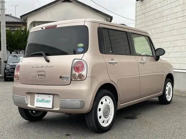 スズキ ラパン ショコラ X 山形県 2014(平26)年 3.7万km シャンパンピンクPM 禁煙車/４ＷＤ/シートヒーター/スマートキー/ＨＩＤヘッドライト/オートエアコン/純正１４インチアルミ/ショコラ専用合皮シート/アイドリングストップ/電動格納ミラー/盗難防止装置/プライバシーガラス/スタッドレス車載