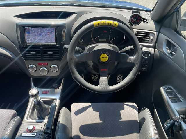 スバル インプレッサ ＷＲＸ STi 広島県 2007(平19)年 13万km WRブルーマイカ /登録時走行距離/　　　　　　　129784キロ/ターボ/4WD/社外ナビ/地デジ/レカロハーフレザーシート/スペアキー×１/ETC/新車時整備手帳/　　【保証書】/取扱説明書/