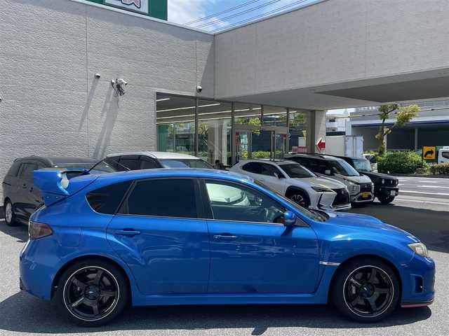 スバル インプレッサ ＷＲＸ STi 広島県 2007(平19)年 13万km WRブルーマイカ /登録時走行距離/　　　　　　　129784キロ/ターボ/4WD/社外ナビ/地デジ/レカロハーフレザーシート/スペアキー×１/ETC/新車時整備手帳/　　【保証書】/取扱説明書/