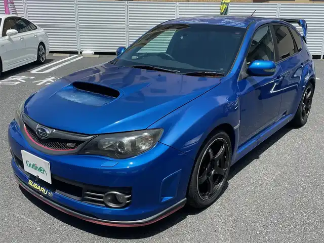 スバル インプレッサ ＷＲＸ STi 広島県 2007(平19)年 13万km WRブルーマイカ /登録時走行距離/　　　　　　　129784キロ/ターボ/4WD/社外ナビ/地デジ/レカロハーフレザーシート/スペアキー×１/ETC/新車時整備手帳/　　【保証書】/取扱説明書/