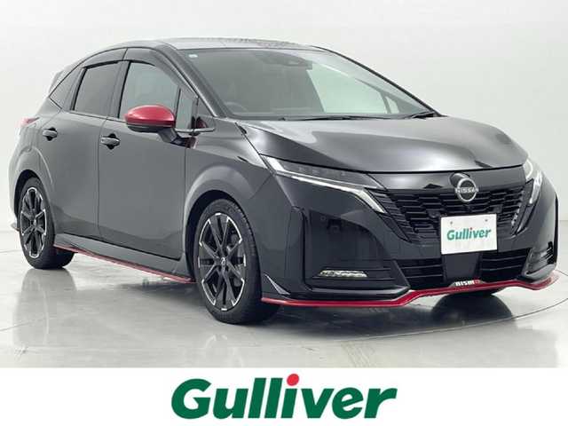 日産 オーラ ニスモ 熊本県 2021(令3)年 2.2万km スーパーブラック ワンオーナー/純正9インチナビ（BT・フルセグ・CD・DVD・SD・USB）/全方位カメラ/ビルトインETC/純正前方ドライブレコーダー/インテリジェントエマージェンシーブレーキ/踏み間違い衝突防止アシスト/標識認識機能/車線逸脱警報/車線逸脱防止支援システム/ふらつき警報機能/ブラインドスポットモニター/横滑り防止/前後クリアランスソナー/ハーフレザーシート/テレビキャンセラー/デジタルインナーミラー/オートホールド/オートライト/オートマチックハイビーム/LEDヘッドライト/スマートキー/プッシュスタート