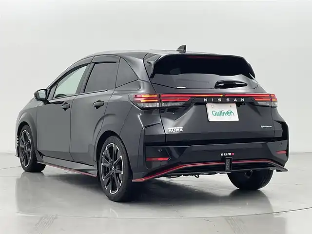 日産 オーラ ニスモ 熊本県 2021(令3)年 2.2万km スーパーブラック ワンオーナー/純正9インチナビ（BT・フルセグ・CD・DVD・SD・USB）/全方位カメラ/ビルトインETC/純正前方ドライブレコーダー/インテリジェントエマージェンシーブレーキ/踏み間違い衝突防止アシスト/標識認識機能/車線逸脱警報/車線逸脱防止支援システム/ふらつき警報機能/ブラインドスポットモニター/横滑り防止/前後クリアランスソナー/ハーフレザーシート/テレビキャンセラー/デジタルインナーミラー/オートホールド/オートライト/オートマチックハイビーム/LEDヘッドライト/スマートキー/プッシュスタート