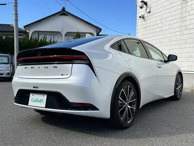 トヨタ プリウス Z 山形県 2023(令5)年 2.7万km プラチナホワイトパールマイカ 4WD/純正ナビ/FM/AM/フルセグ//トヨタセーフティセンス/プリクラッシュセーフティ/レーンディパーチャーアラート/ブラインドスポットモニター/パーソナルデジタルアシスタント/ロードサインアシスト/クリアランスソナー/リヤクロストラフィックアラート/パーキングサポートブレーキ/デジタルインナーミラー/クルーズコントロール/パーキングアシスト/パワーバックドア/レザーシート/パワーシート/シートヒーター/エアーシート/革巻きステアリング/ハンドルヒーター/オートマチックハイビーム/オートライト/LEDヘッドライト/フォグランプ/ビルトインETC2.0/AC100V/DRIVE MODE/EV MODE/スマートキー/プッシュスタート/横滑り防止