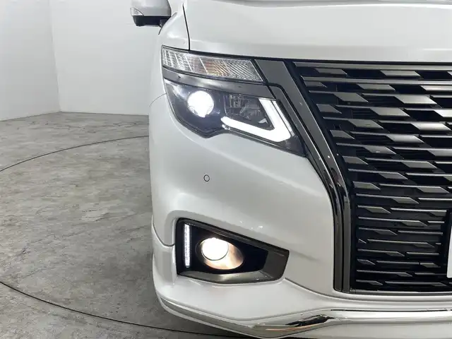 日産 エルグランド 250HWS S アーバンクロム 福島県 2024(令6)年 1.3万km ピュアホワイトパール インテリジェントエマージェンシーブレーキ/・前後コーナーセンサー/プロパイロット/・追従式クルーズコントロール/・車線維持/・ブラインドスポットモニタリング/フリップダウンモニター/純正大画面ナビ/・型番なし/・AM/FM/CD/DVD/BT/HDMI/フルセグTV/・全方位/フロント/バック/サイドカメラ/・ETC/・前後ドライブレコーダー/両側パワースライドドア/ハーフレザーシート/・オットマン/プッシュスタート/・スマートキー/LEDヘッドライト/・オートライト/・オートハイビーム/純正エアロ/・フロント/サイド/リア/純正フロアマット