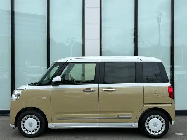 ダイハツ ムーヴ キャンバス ストライプス G 大阪府 2025(令7)年 0.3万km シャイニングホワイトパール/サンドベージュメタリック スマートアシスト/純正ナビ　/   フルセグTV/CD/DVD/Bluetooth/USB　/バックモニター　/クリアランスソナー　/前席シートヒーター　/両側パワースライドドア　/アイドリングストップ/オートマチックハイビーム/純正14インチアルミホイール　/純正フロアマット　/プッシュスタート　/スマートキー　/ＬＥＤライト
