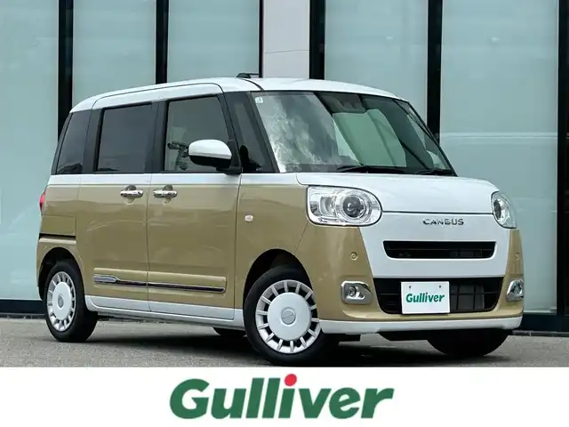 ダイハツ ムーヴ キャンバス ストライプス G 大阪府 2025(令7)年 0.3万km シャイニングホワイトパール/サンドベージュメタリック スマートアシスト/純正ナビ　/   フルセグTV/CD/DVD/Bluetooth/USB　/バックモニター　/クリアランスソナー　/前席シートヒーター　/両側パワースライドドア　/アイドリングストップ/オートマチックハイビーム/純正14インチアルミホイール　/純正フロアマット　/プッシュスタート　/スマートキー　/ＬＥＤライト