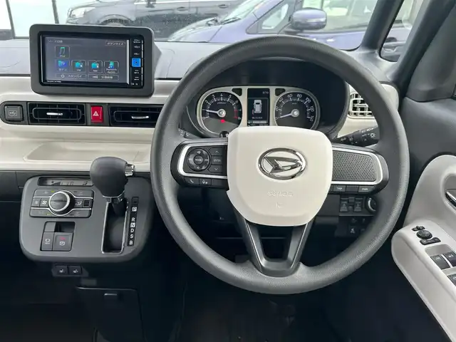 ダイハツ ムーヴ キャンバス ストライプス G 大阪府 2025(令7)年 0.3万km シャイニングホワイトパール/サンドベージュメタリック スマートアシスト/純正ナビ　/   フルセグTV/CD/DVD/Bluetooth/USB　/バックモニター　/クリアランスソナー　/前席シートヒーター　/両側パワースライドドア　/アイドリングストップ/オートマチックハイビーム/純正14インチアルミホイール　/純正フロアマット　/プッシュスタート　/スマートキー　/ＬＥＤライト