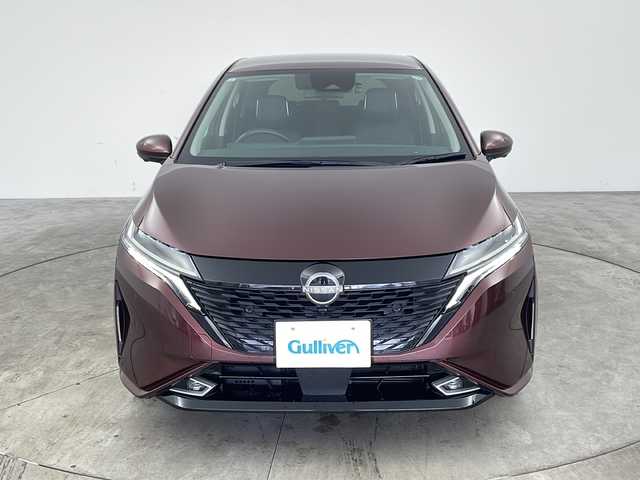 日産 オーラ G レザーエディション 兵庫県 2021(令3)年 4.3万km バーガンディー ・ワンオーナー車/・純正ディスプレイオーディオ/・Bluetooth/USB/HDMI/Apple car play/Android Auto/AM/FM/フルセグテレビ/・アラウンドビューモニター/・プロパイロット/・車線逸脱警報/・車線逸脱防止支援/・後側方車両検知警報/・後側方衝突防止支援/・後退時車両検知警報/・前後クリアランスソナー/・レーダークルーズコントロール/・ブラインドスポットモニター/・オートマチックハイビーム/・エマージェンシーブレーキ/・速度標識表示/・ルート減速支援/・速度制限支援/・標識検知支援/・ふらつき警報/・横滑り防止装置/・革巻きステアリング/・ステアリングスイッチ/・インテリジェントミラー/・電動パーキングブレーキ/・オートホールドブレーキ/・革シート/・BOSEサウンド/・純正フロアマット/・LEDヘッドライト/・純正アルミホイールタイヤ/・純正ドライブレコーダー/・ビルトインETC/・取扱説明書/・保証書/・スペアキー/・ワイヤレス充電