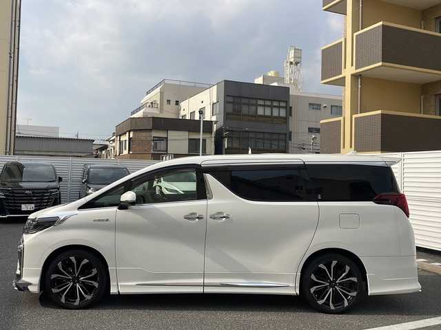 トヨタ アルファードハイブリット エグゼクティブ ラウンジ S 広島県 2019(令1)年 4.7万km ホワイトパールクリスタルシャイン /登録時走行距離/　　　　　　　46213キロ/4WD/メーカーナビ/パノラミックビューモニター/地デジ/JBLサウンドシステム/黒革シート/エアシート/PCS/純正フリップダウンモニター/モデリスタAW/nano/ビルトインETC/新車時整備手帳/　　【保証書】/取扱説明書/