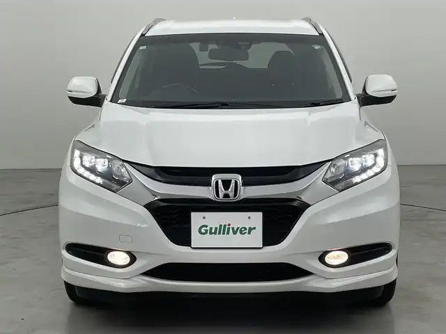ホンダ ヴェゼル ハイブリッド Z 福岡県 2016(平28)年 8.3万km ホワイトオーキッドパール 純正７型ナビ（ＢＴ，フルセグＴＶ）　/バックカメラ　/ＥＴＣ　/前方ドライブレコーダー　/クルーズコントロール　/シティブレーキアクティブシステム　/ＥＣＯＮ　/パドルシフト　/ハーフレザーシート　/純正１７インチＡＷ