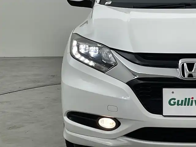 ホンダ ヴェゼル ハイブリッド Z 福岡県 2016(平28)年 8.3万km ホワイトオーキッドパール 純正７型ナビ（ＢＴ，フルセグＴＶ）　/バックカメラ　/ＥＴＣ　/前方ドライブレコーダー　/クルーズコントロール　/シティブレーキアクティブシステム　/ＥＣＯＮ　/パドルシフト　/ハーフレザーシート　/純正１７インチＡＷ