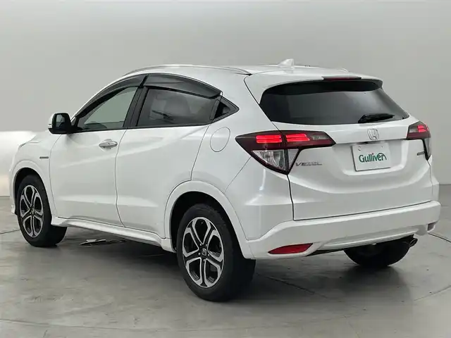 ホンダ ヴェゼル ハイブリッド Z 福岡県 2016(平28)年 8.3万km ホワイトオーキッドパール 純正７型ナビ（ＢＴ，フルセグＴＶ）　/バックカメラ　/ＥＴＣ　/前方ドライブレコーダー　/クルーズコントロール　/シティブレーキアクティブシステム　/ＥＣＯＮ　/パドルシフト　/ハーフレザーシート　/純正１７インチＡＷ