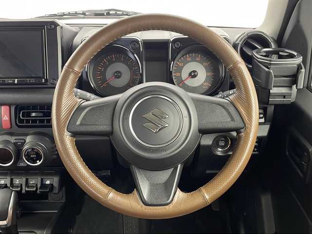 スズキ ジムニー XL 新潟県 2022(令4)年 3.5万km シフォンアイボリーM スマートキー/社外メモリナビ(AVIC-RL512)/フルセグTV/バックカメラ/ETC/純正ゴムフロアマット/革調シートカバー/社外リアラダー/スペアキー/ターボ