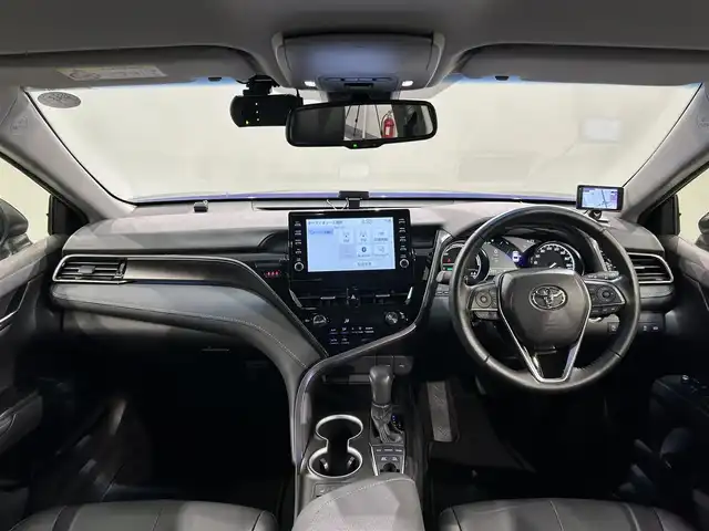 トヨタ カムリ WSレザーパッケージ 愛知県 2021(令3)年 2.8万km ダークブルーマイカM 純正９インチディスプレイオーディオ/衝突軽減ブレーキ/レーダークルーズコントロール　/レーンキープアシスト/クリアランスソナー/ブラインドスポットモニター/ビルトインＥＴＣ２．０/レザーシート/シートヒーター/バックカメラ/パドルシフト/ドライブレコーダー/カラーヘッドアップディスプレイ　/純正18インチアルミホイール/純正フロアマット/4WD